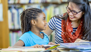 Woman reading to a child